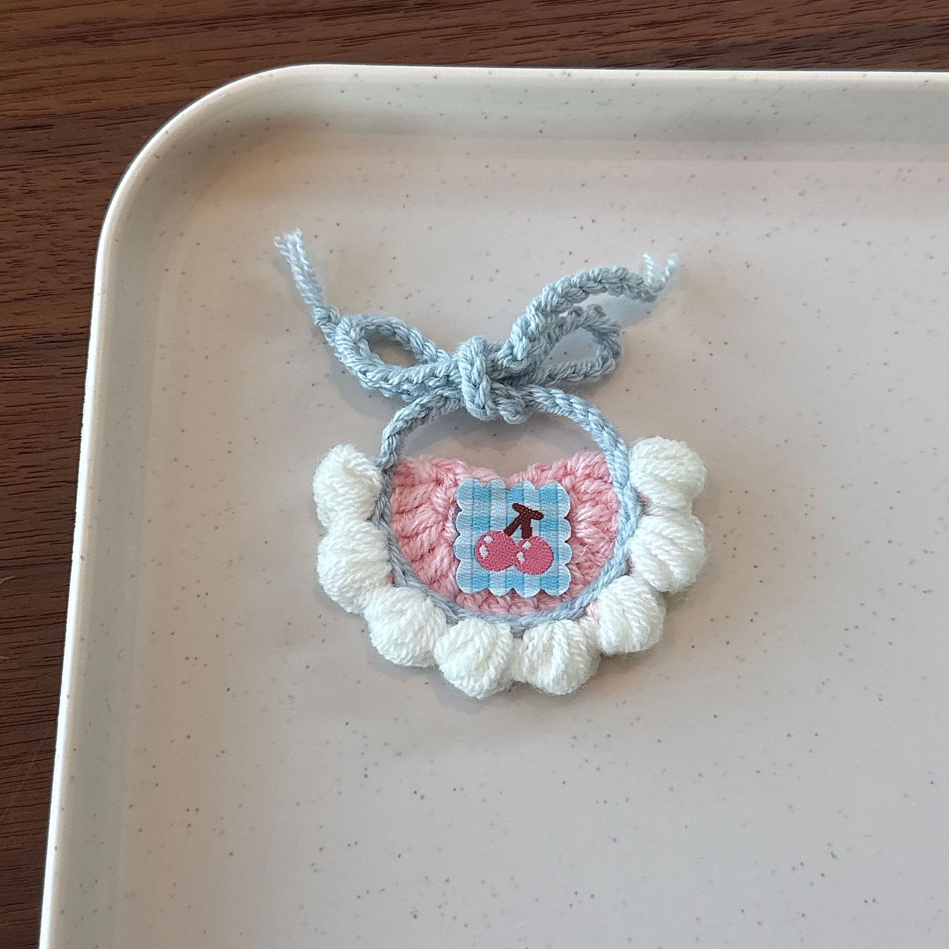 Pink cherry bib