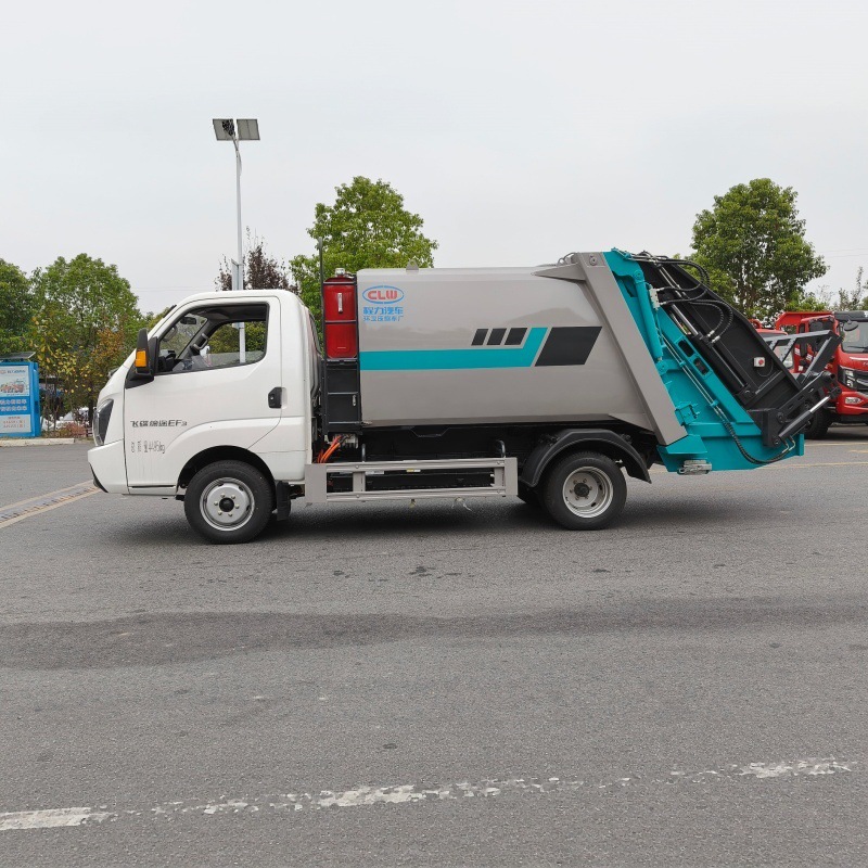 Pure electric sanitation vehicle with a sealed garbage compactor, designed for automatic compression of municipal solid waste for collection and transportation
