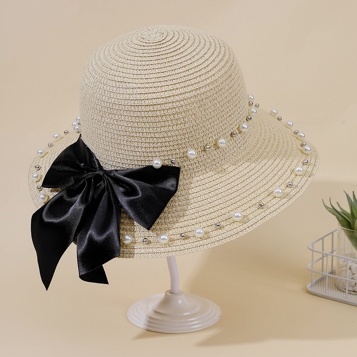 Estilo coreano bowknot de la moda de las mujeres perla sombrero de paja sombrero de sol padre-hijo sombrero de sol sombrero de playa de la playa de moda