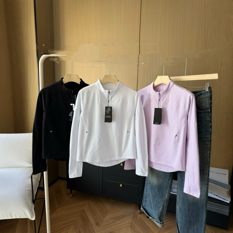 6951 Women's short, slightly loose-fitting, slim-fit long-sleeve T-shirt with a small stand-up collar and half-zip, in a solid color, suitable for sports 6951 Women's short, slightly loose-fitting, slim-fit long-sleeve T-shirt with a small stand-up collar and half-zip, in a solid color, suitable for sports