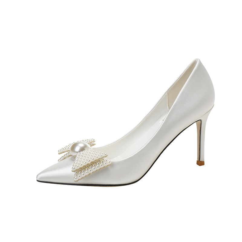Scarpe da sposa bianche con fiocco eleganti tacchi donna_voghion.com