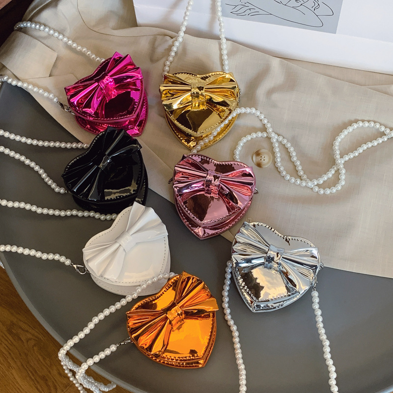 Bolso de hombro de niña brillante láser de moda Mini love bowknot bandolera de bebé bolso de cadena de perlas para niños