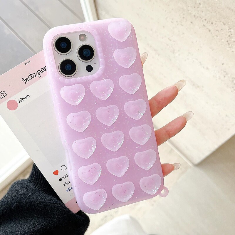 Suitable for iPhone 18 Pro Max, featuring a heart-shaped glitter design, suction cup phone case, and a full-coverage, drop-resistant protective case for Apple 17 and 15