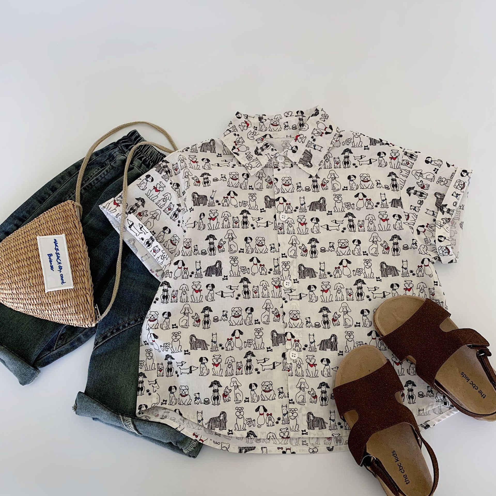 Camisa de manga corta para niños Maibao 2025 verano nuevo estilo coreano niño camisa de cachorro de impresión completa niño verano al por mayor