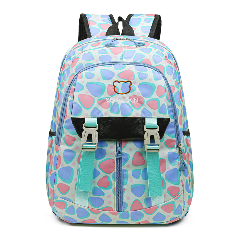 Fábrica al por mayor nueva mochila escolar de estudiantes de primaria y secundaria, mochila ligera de ocio de gran capacidad, mochila de viaje de bolsillo