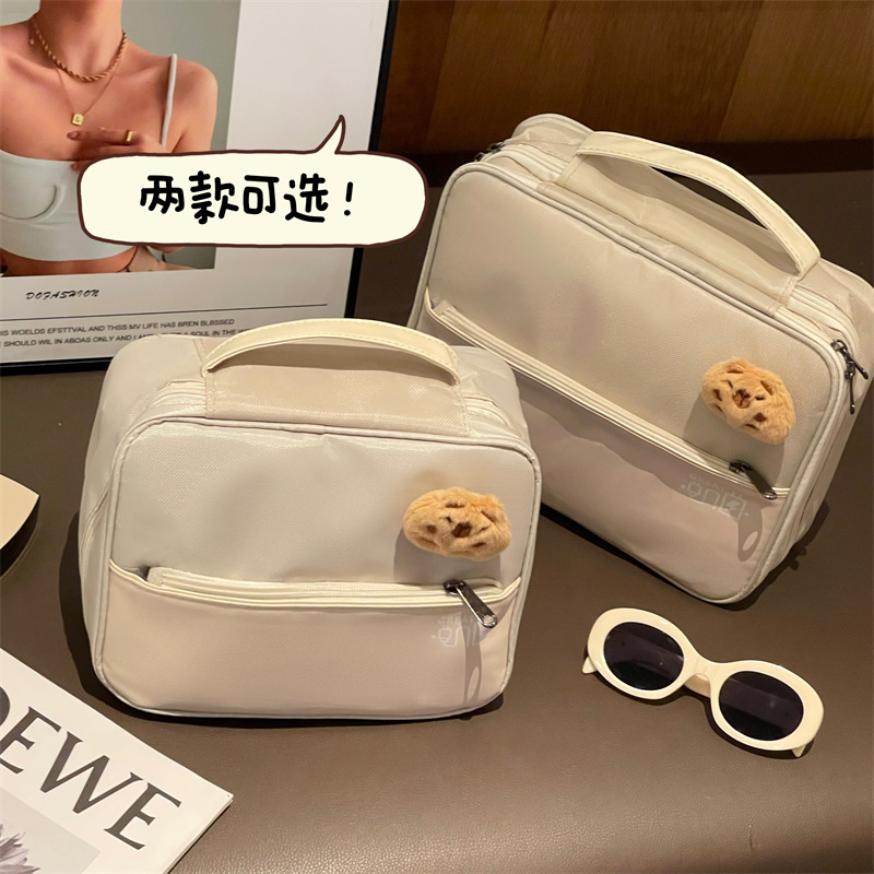 Nueva bolsa de maquillaje de gran capacidad multifuncional para salir bolsa de lavado portátil de alto valor facial bolsa de almacenamiento de maquillaje impermeable de tres capas