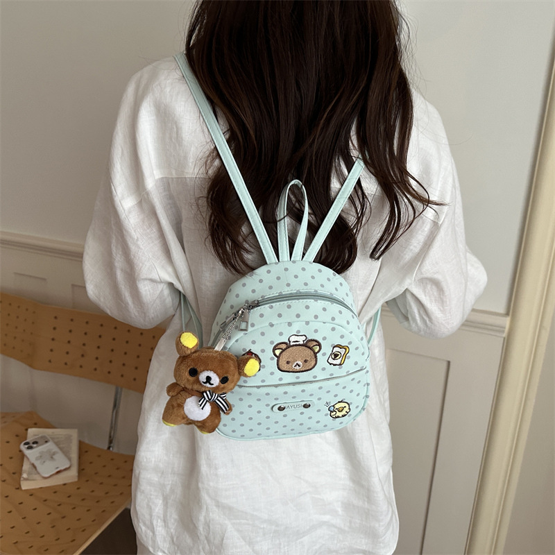 Nuevo lindo nicho de diseño ondulado punto mochila tendencia ocio femenina 2026 estilo extranjero viaje viaje mochila pequeña