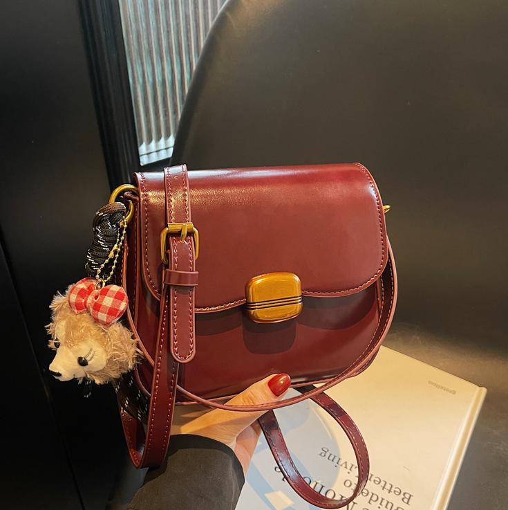 Bolso de tendencia popular de comercio exterior para mujeres 2025, nueva moda extranjera simple bolso de hombro de alta sensación bolso pequeño