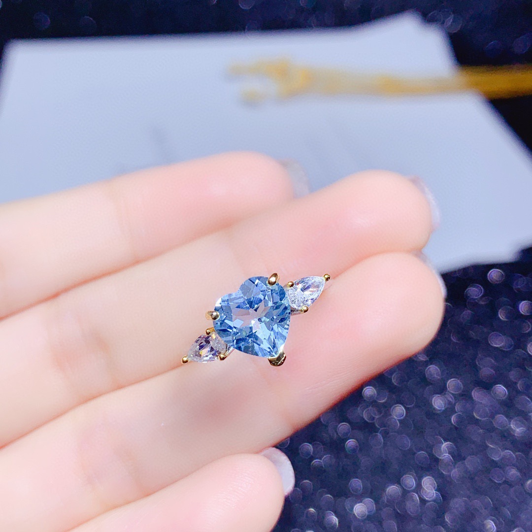 New Imitating Natural Heart-shaped Sky Blue Topaz Color Treasure Opening Ring display picture 1