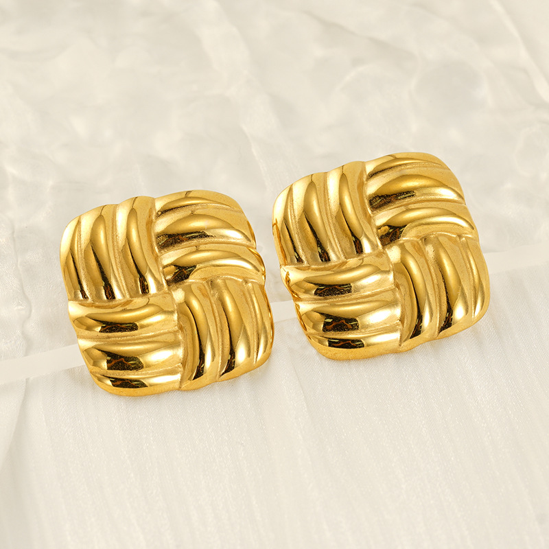 Pendientes de acero inoxidable dorado de 18k estilo INS europeo y americano Pendientes de raya geométrico giratorio en espiral al por mayor