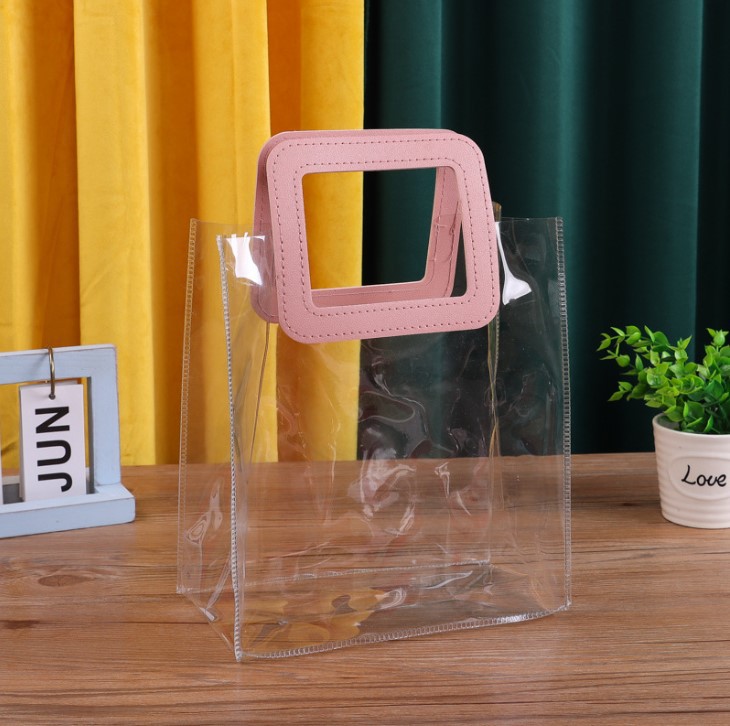 Navidad mano bolsa de regalo de la boda regreso dama de honor bebé luna llena caja de dulces de pvc transparente regalo de la mano