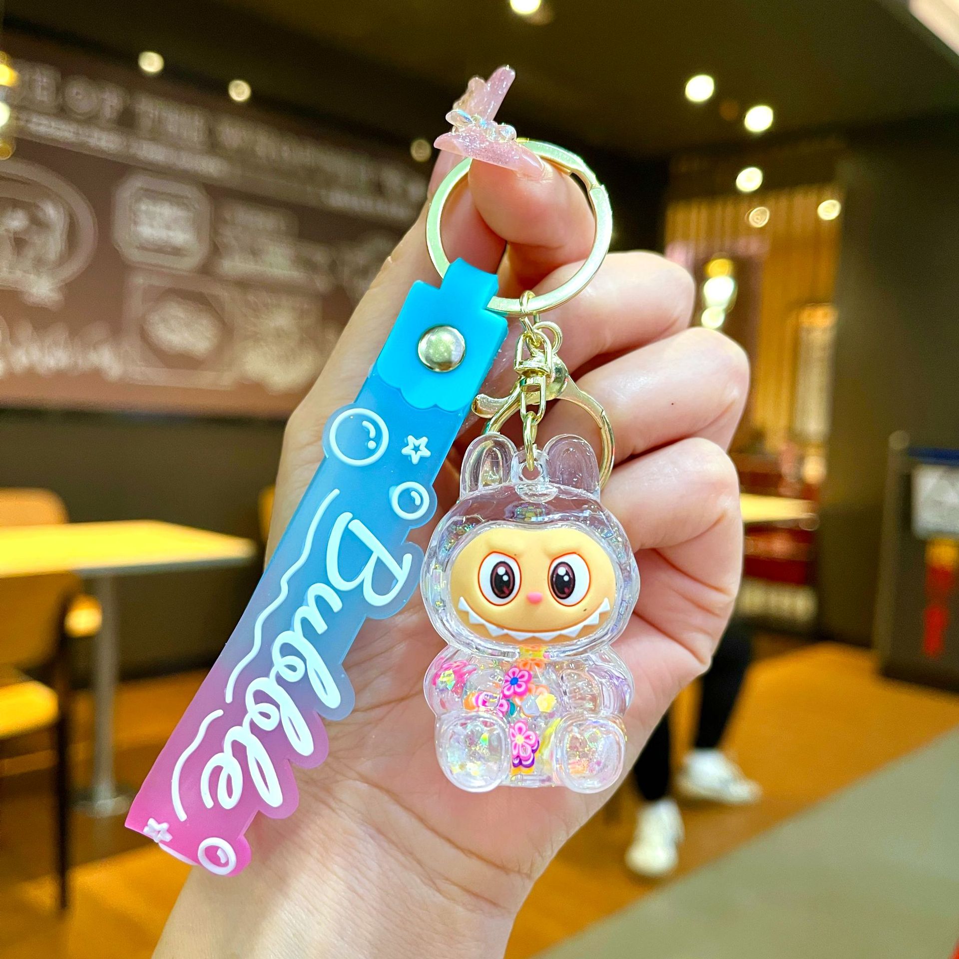 Llavero red acrílico con arena flotante