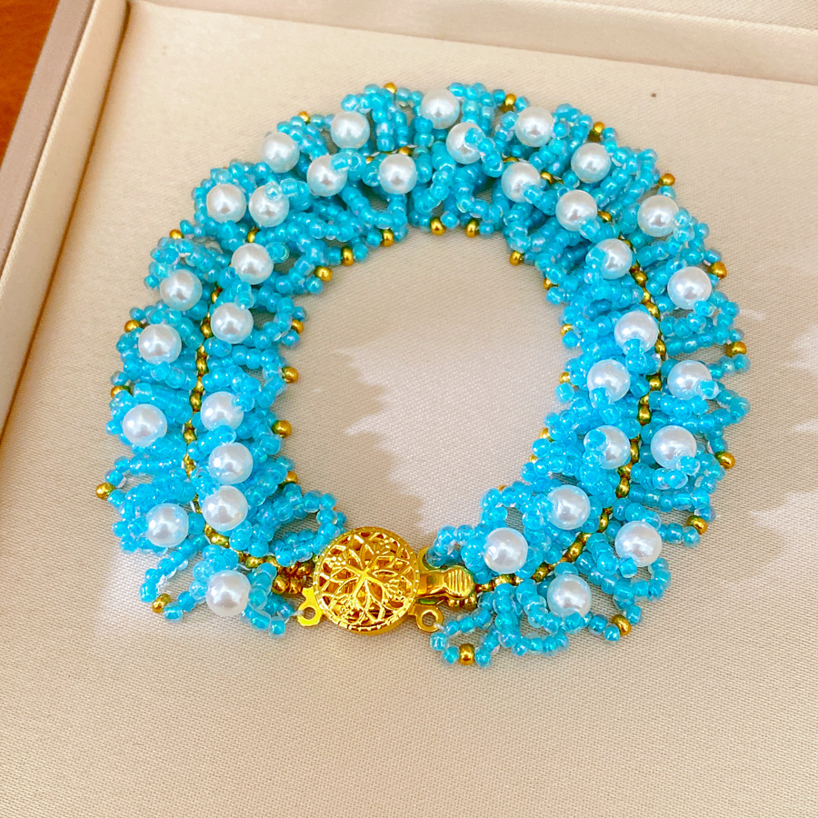 Accesorios de vacaciones pulseras de perlas ligeras de lujo nicho pulseras de alto nivel personalidad temperamento de moda joyas al por mayor