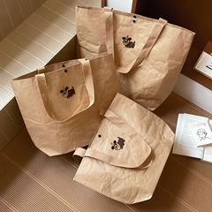 卡通小狗牛皮纸手提包包新款大容量简约托特包出差通勤百搭单肩包
