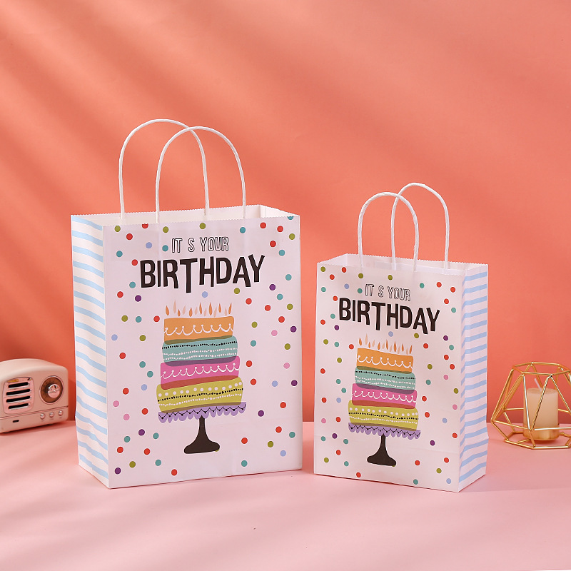 Bolsas de regalo de cumpleaños transfronterizas, bolsas de mano, bolsas de cartón, bolsas de embalaje, bolsas de regalo de dibujos animados en stock al por mayor