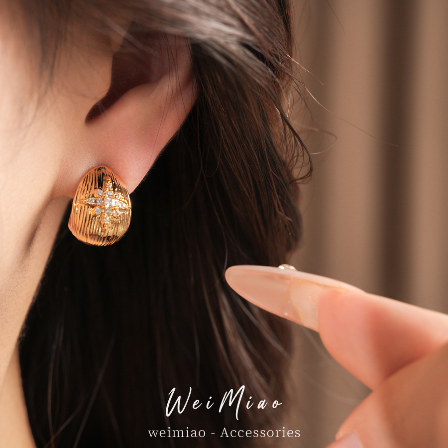 18k oro real chapado agujas de plata zircon flores gotas de agua pendientes de aretes personales de aire frío pendientes de aretes de lujo ligero de alto nivel
