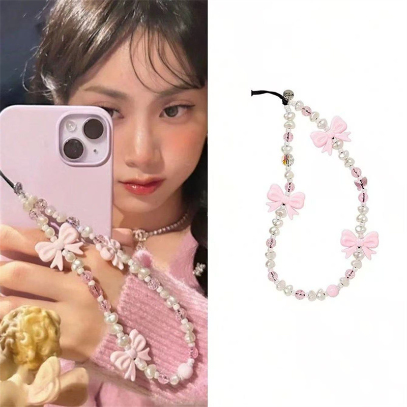 Cute Japanese and Korean style bow-knot phone wristband, versatile, uniquely shaped faux pearl, Instagram style, girls' phone chain/camera.