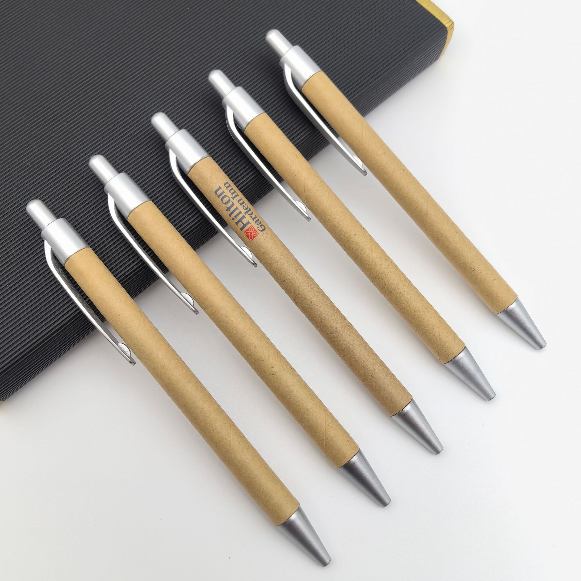 Presione bolígrafo de tubo de papel ecológico mayorista accesorios de logotipo personalizados bolígrafo de papel de pulverización de plata especial hotel