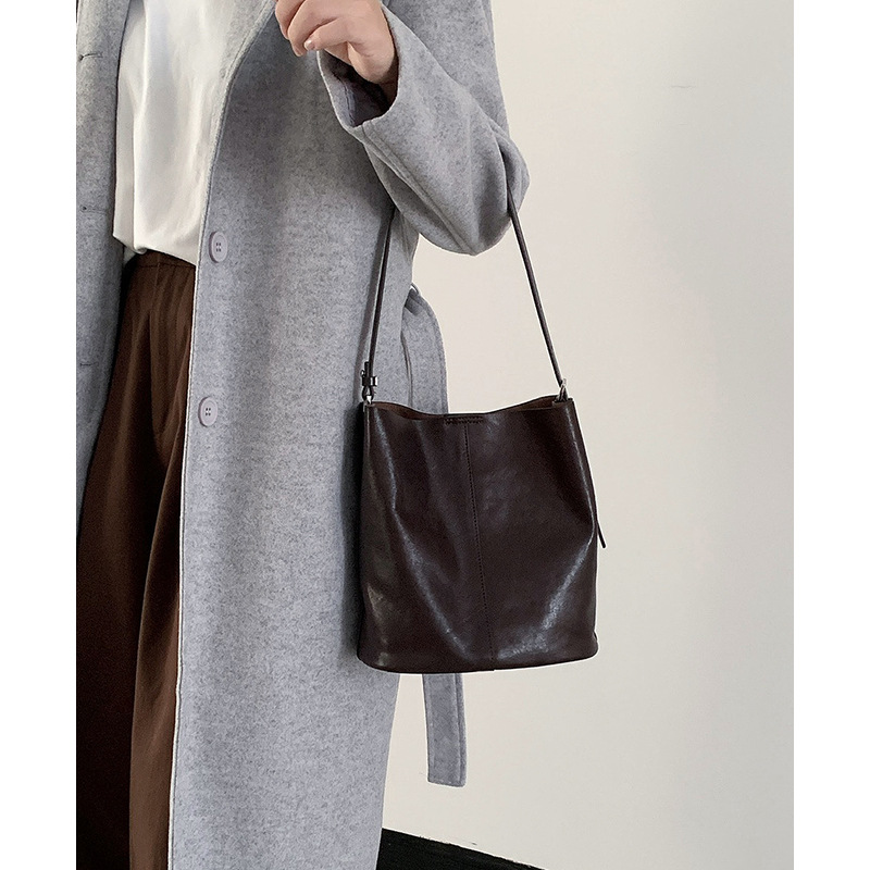 【 Vera pelle da donna 】 Borsa a secchiello monospalla in pelle bovina conciata al vegetale leggera e di lusso alla moda, sensoriale di alta qualità_voghion.com
