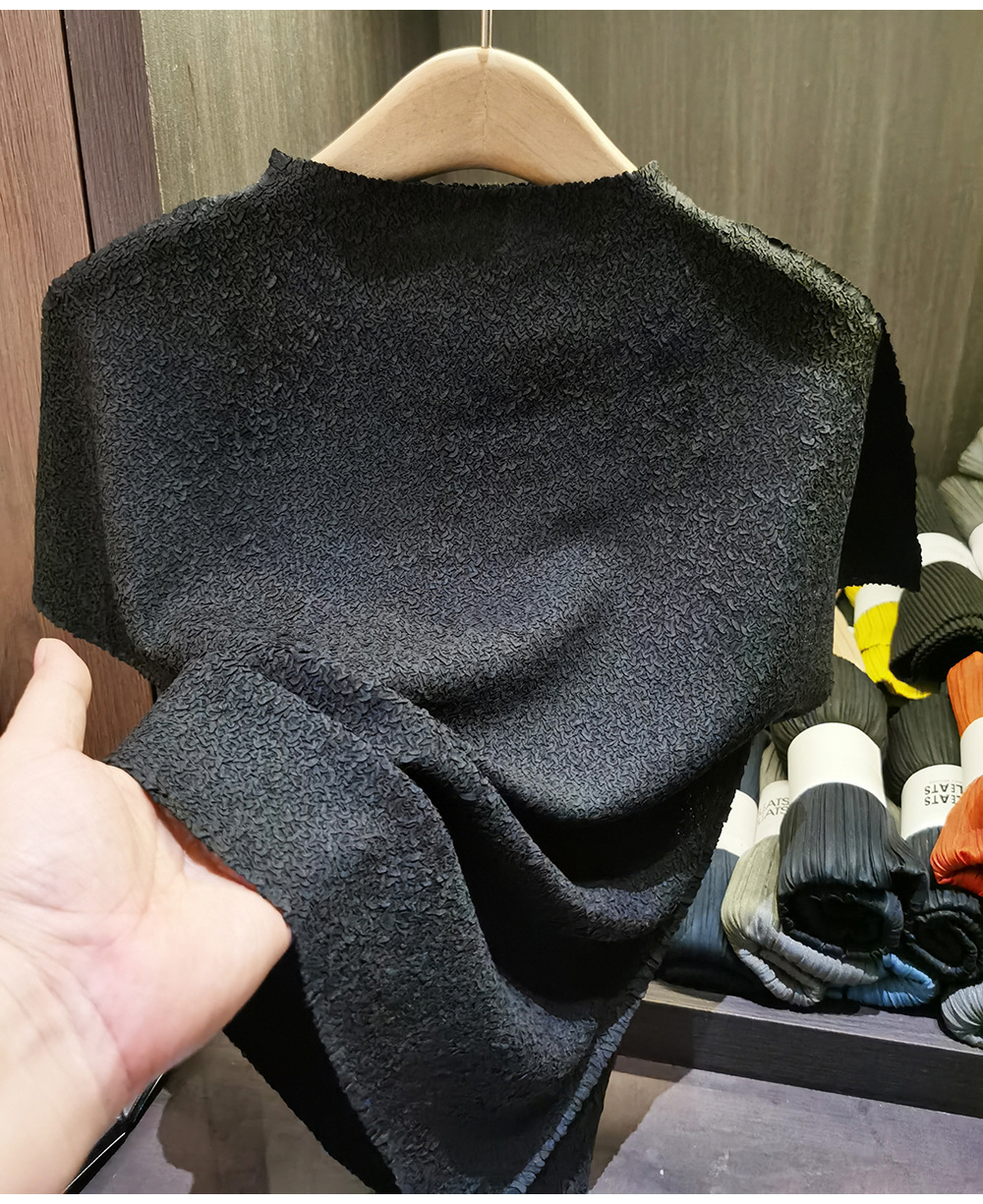 Áo thun nữ cổ đứng tay ngắn, chất liệu phối nhún tạo phồng nhẹ, form suông thoải mái — màu đen, màu xanh đậm, xanh lá cây, Gừng chi tiết 16