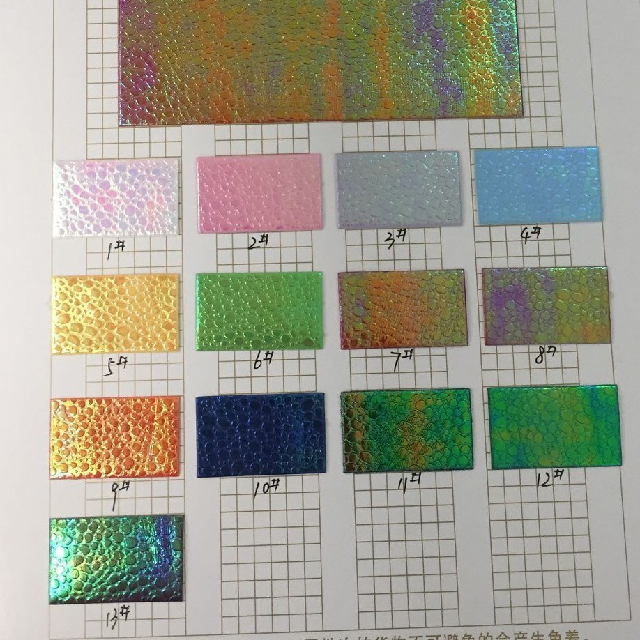 厂家直销幻彩镭射PU皮革面料批发碎石纹手袋鞋材化妆盒人造革面料