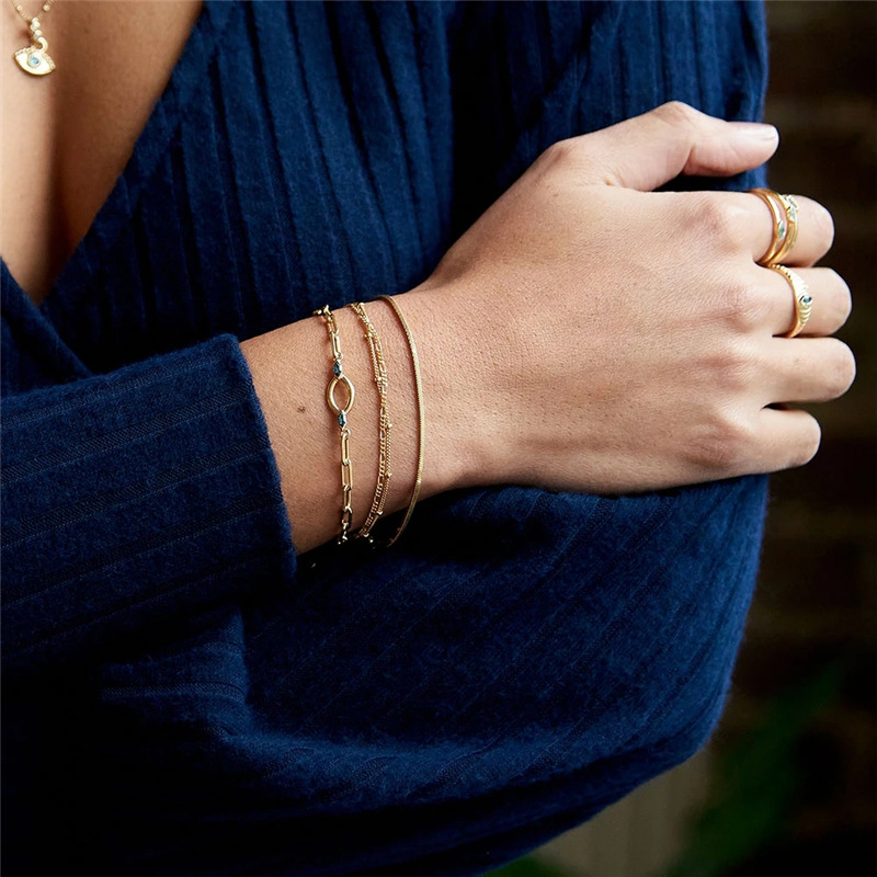 Moda europea y americana INS cruz de superposición creativa cadena de serpiente plana pulsera de todo fósforo traje de todo fósforo de moda