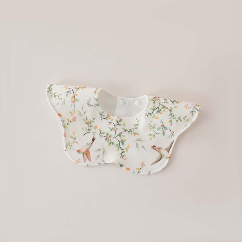 Birds dancing among flowers, petals saliva towel