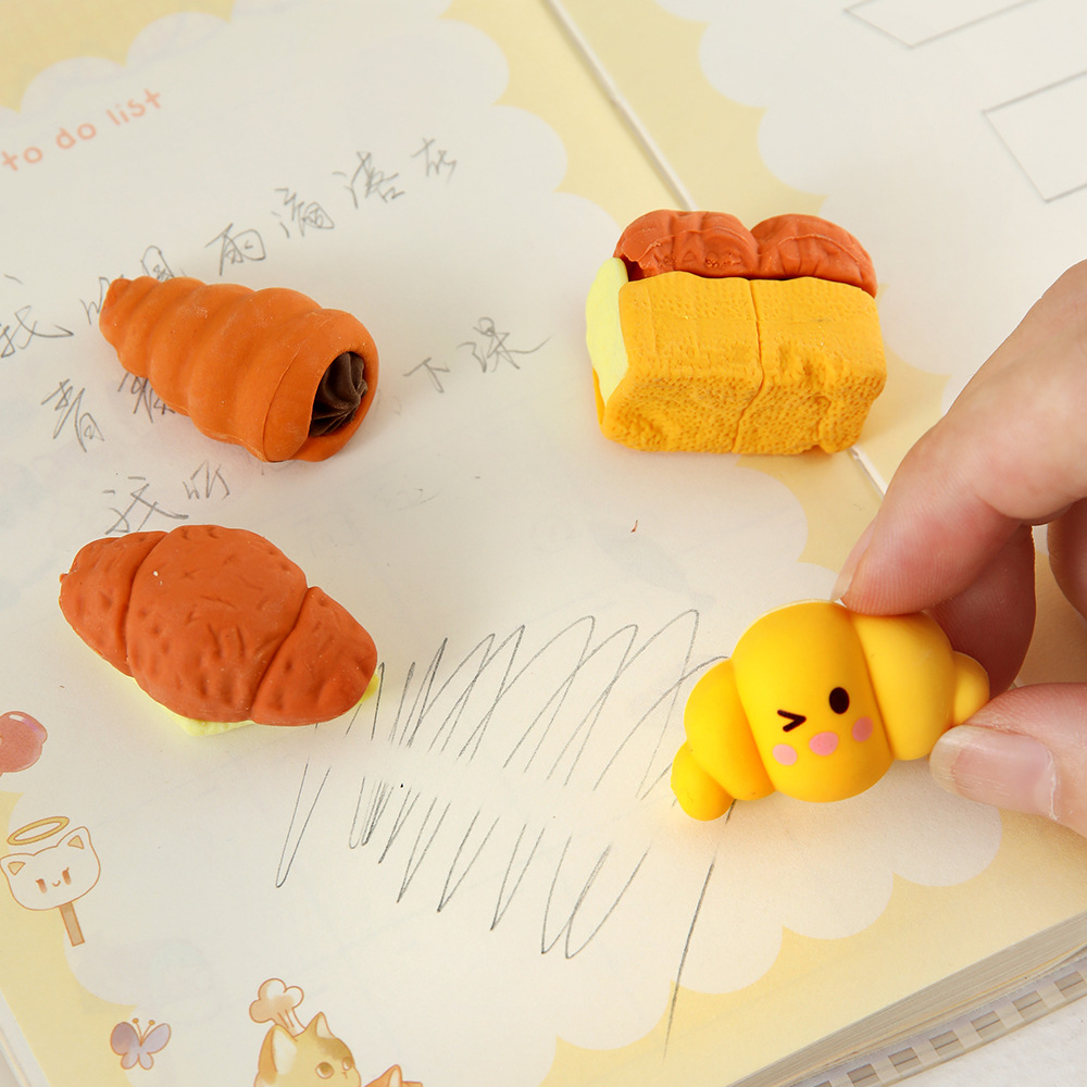 Nuevos productos Yuanqi desayuno simulación de alimentos juegan borracha de goma de papelería de estudiantes limpieza borracha de goma de ensamblaje inteligente