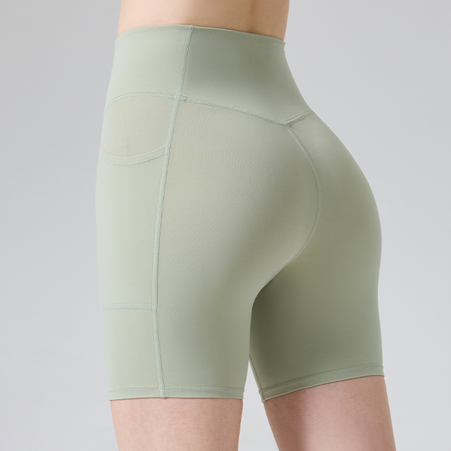 Verano nuevo N66 Laica alto elástico ángulo plano pantalones cortos de yoga apretados bolsillos grandes dobles cintura y abdomen para elevar el estómago