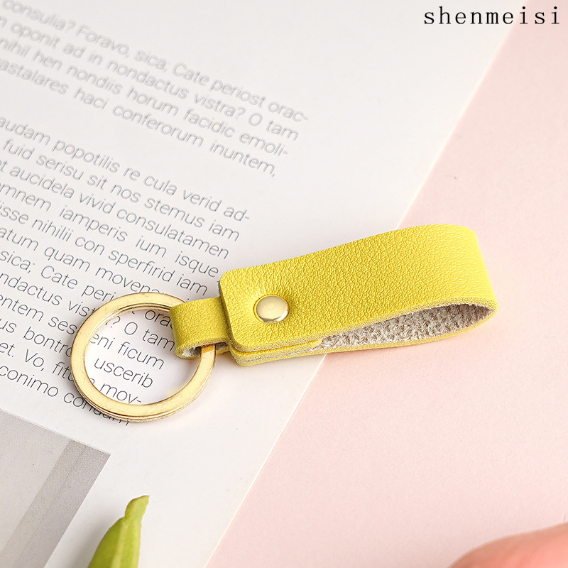 Keychain de cuero pu transfronterizo estilo simple de mano hebilla de cuero logotipo imprimible colgante de cuero llavero para hombres y mujeres