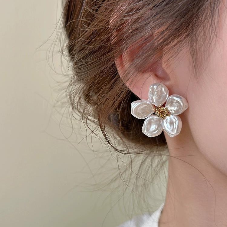 Small design demi-season earrings from pearl