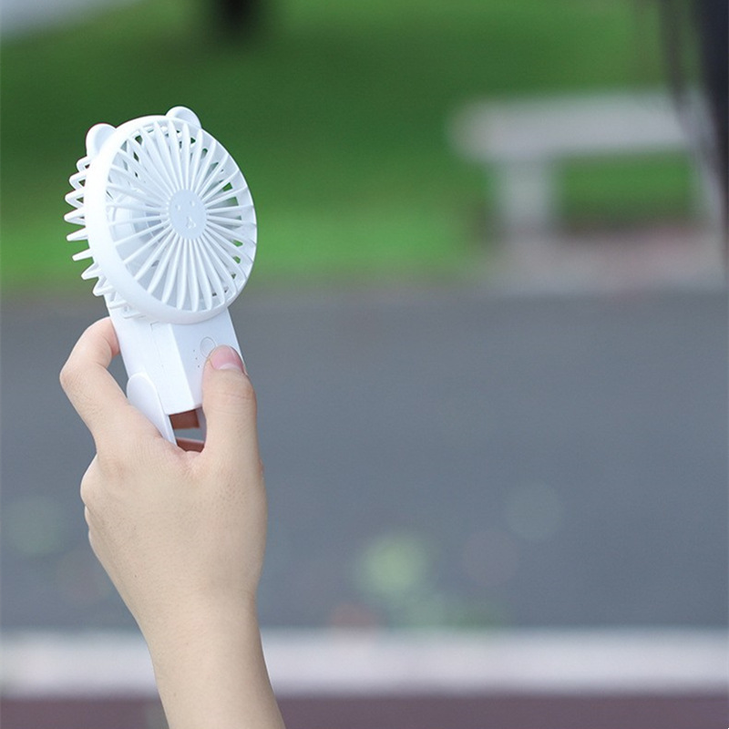 Verano nuevo oso ventilador plegable portátil mini estudiante ventilador eléctrico USB de carga ventilador de bolsillo