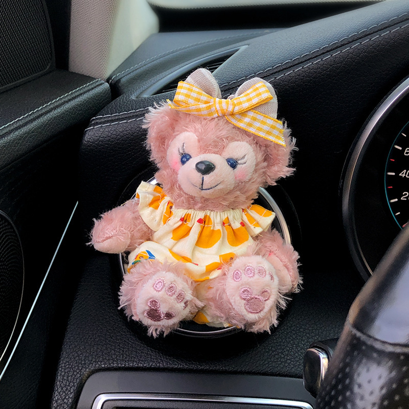 2025 nuevo coche muñeca oso de felpa Tamiflu coche aromaterapia de salida de aire decoración interior accesorios de coche decoración mujer