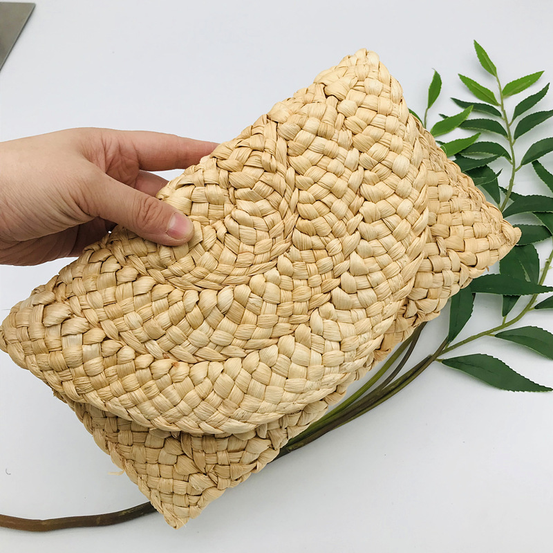 New corn fur woven bag hand bag women's large capacity clip bag hand woven bag mobile phone bag zero wallet Japan and South Korea