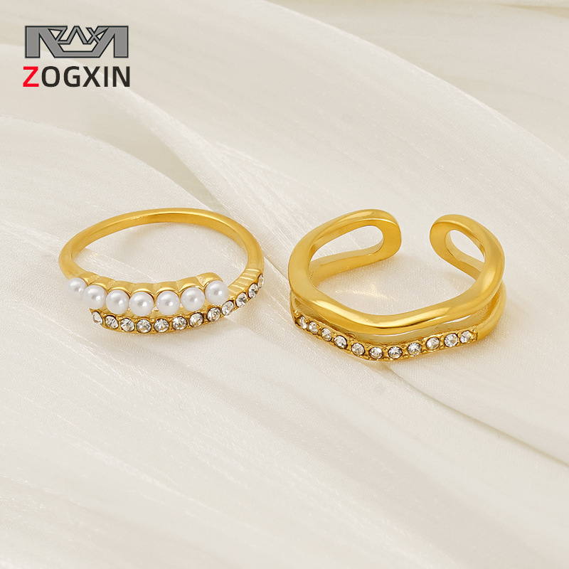 Japón y Corea del Sur nuevo tipo geométrico cruz oro INS viento temperamento ligero lujo con incrustaciones de perlas anillo de ajuste de apertura mujer