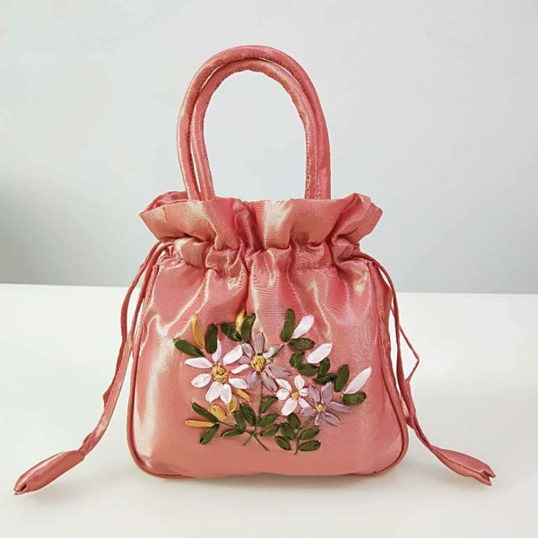 Orange red pumping rope embroidered bag