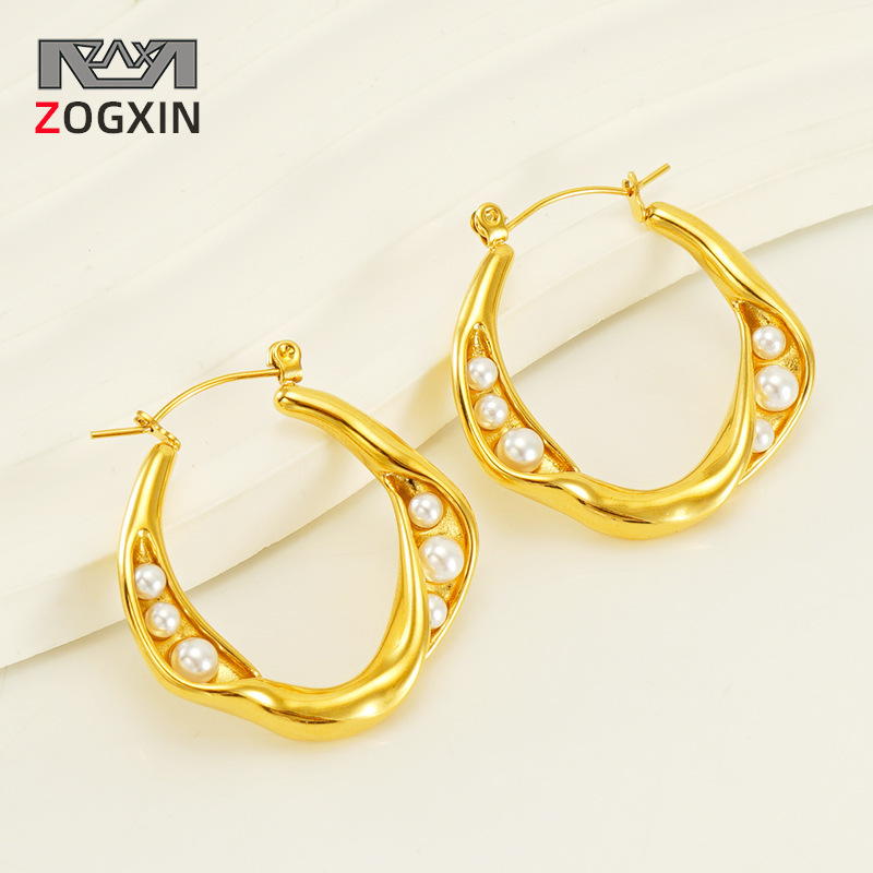 Pendientes de círculo geométrico de diseño avanzado de acero inoxidable europeo y americano pendientes de perlas vintage de mujer pendientes de acero de titanio pendientes