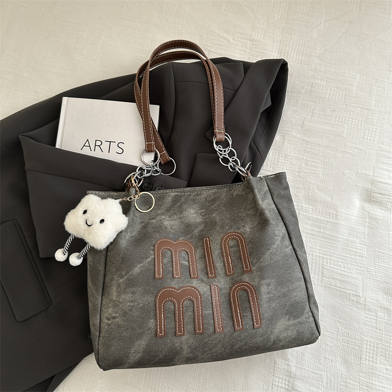 Bolso de otoño de mujer de gran capacidad de transporte 2024 nuevo bolso de hombro de moda nicho de alto nivel bolso de brazo