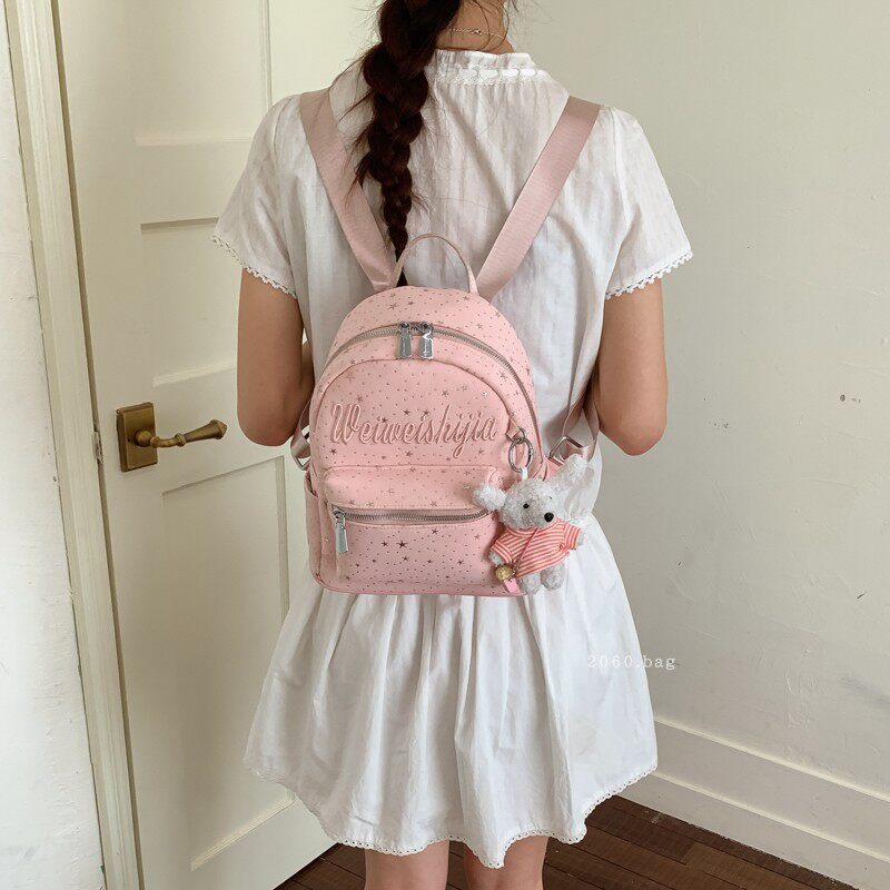 Mochila de moda mochila 2026 mochila de gran capacidad para estudiantes universitarios en clase nueva primavera bolsa de letras lienzo para mujeres