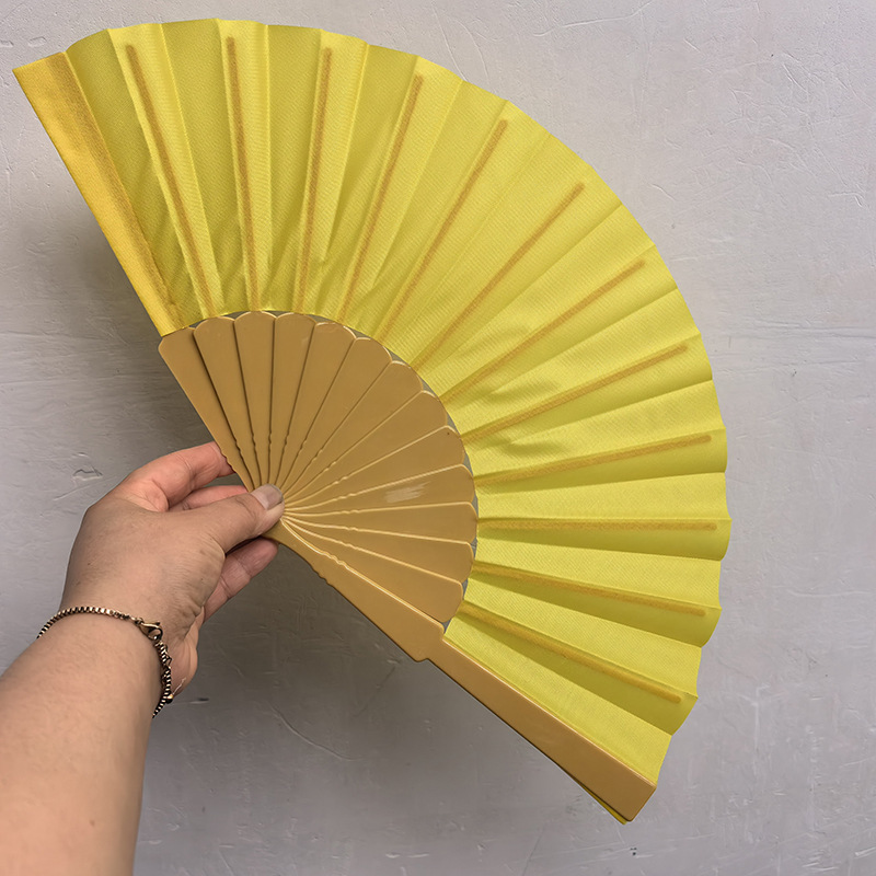Abanico de superficie plana de plástico dorado