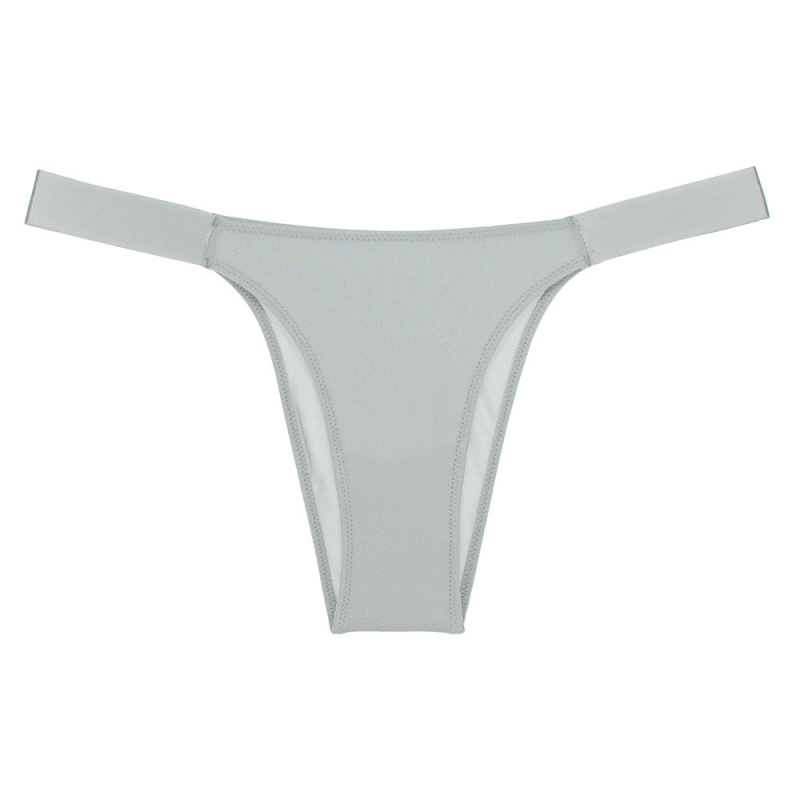 外国貿易の大きいブランドの新商品の女性の下着の純色のシルクの光の三角のズボンの低い腰のt字のズボンの版は尻の欧米のF008を包みます|undefined
