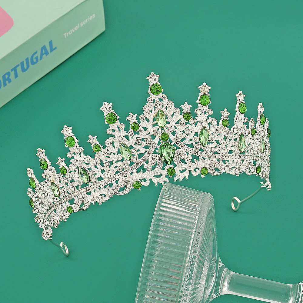 Corona de plata + diamante verde