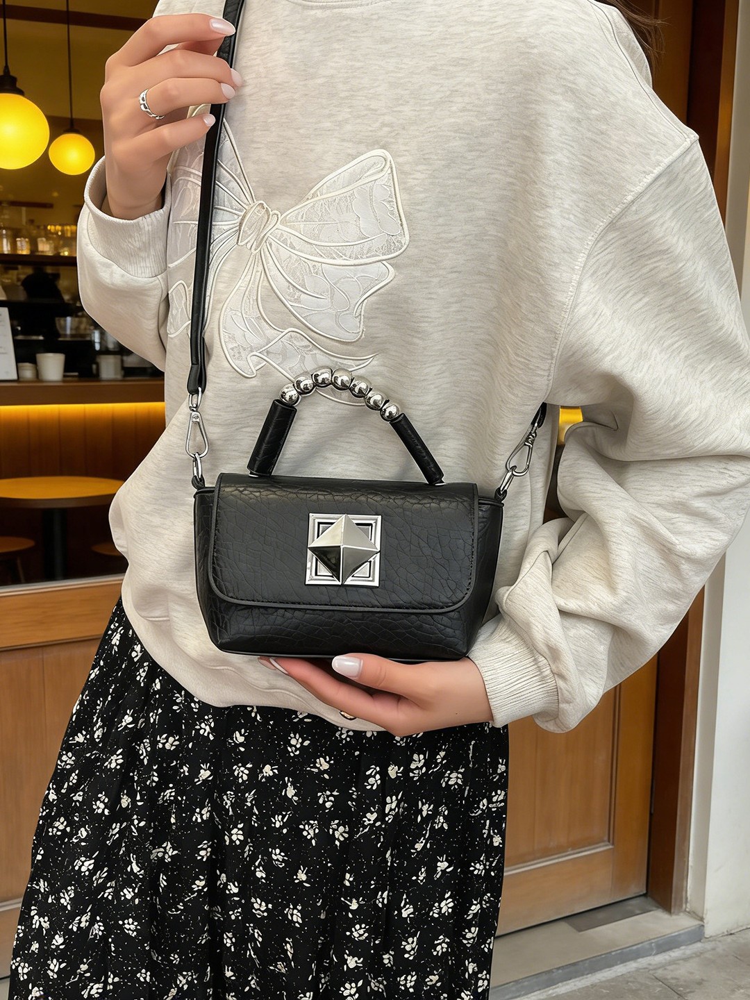 Bolso de mano de moda para mujeres 2026 nuevo estilo universal primavera y verano simple casual estilo coreano alta sensación mochila