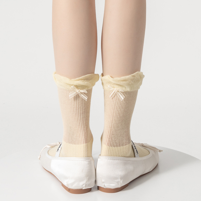 Miu serie calcetines mujer primavera y verano nuevo producto tacón lazo pila de calcetines capullo máquina todo en uno deshuesado tubo central Lolita