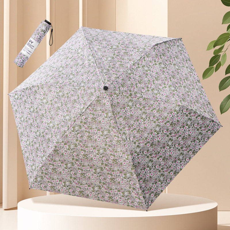 三つ折り超軽量傘日焼け止め紫外線防止傘黒ゴム傘携帯折り畳み晴れ傘両用日傘女