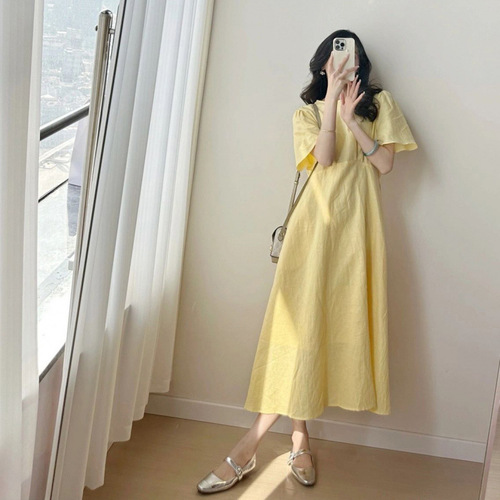 A charming French-style tea party dress for women that captivates at first glance, perfect for summer 2025 vacation fashion.