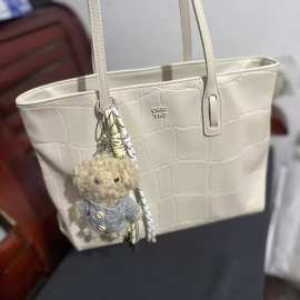 南枫百搭时尚奶油日志托特包包女士大容量新款手提单肩包通勤