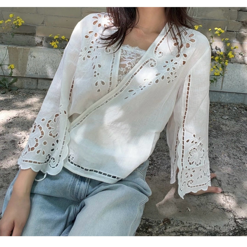 French-style niche 2026 autumn/winter new elegant white hollow embroidered shirt with V-neck and tie wrap top French-style niche 2026 autumn/winter new elegant white hollow embroidered shirt with V-neck and tie wrap top