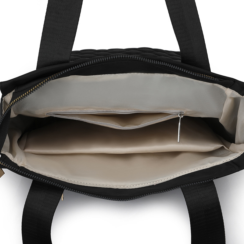 Mochila de mujer salvaje de color puro 2024 nueva mochila portátil de moda, bolso de viaje ligero y de gran capacidad