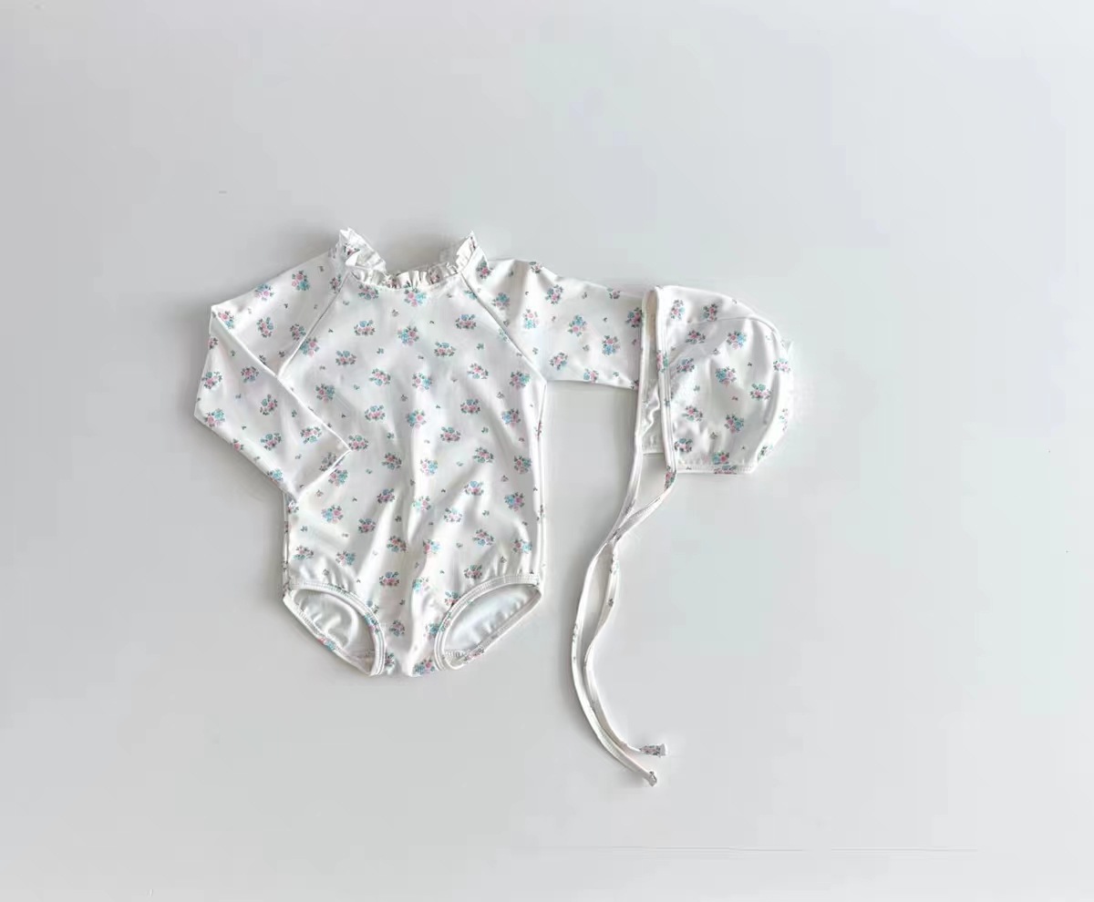 INS estilo coreano niñas dibujos animados bebé impreso alto elástico de una pieza de manga larga traje de baño de dos piezas traje de moda gorro de natación